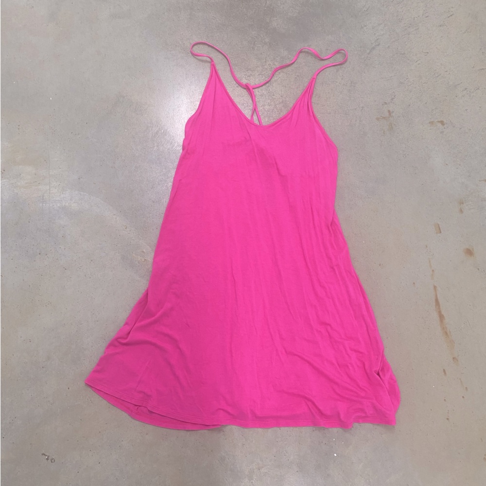 Victoria secret pink colored L/XL slip dress with adjustable ties in back.